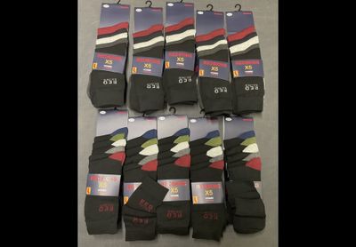 six pairs of men ' s socks with different designs on them