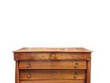 an image of a wooden chest of drawers on a white background