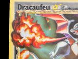 a close up of a pokemon card with a dragon on it