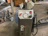 an image of a machine that is in a garage