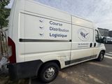 a white van parked on the side of the road
