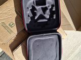 a box with a bunch of pieces in it on the ground
