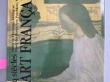 a book with a picture of a woman sitting at a table