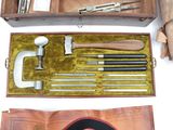 a case with tools in it on a white surface