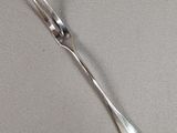 a fork and a spoon on a table