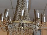 a chandelier hanging from the ceiling in a room