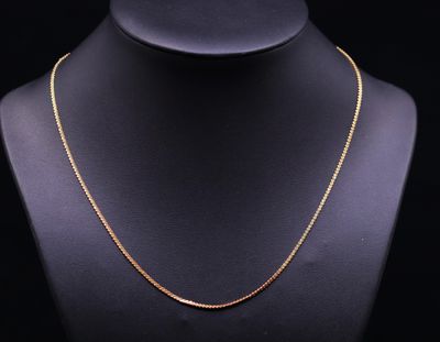 a gold chain necklace on a mannequin mannequin mannequin mannequin mannequin mannequin mannequin mannequin manne