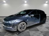 a picture of a blue car parked in a garage