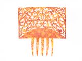 a drawing of a comb with a floral design on it