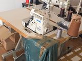 a sewing machine sitting on a table in a room