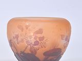 a small glass bowl with a floral design on it
