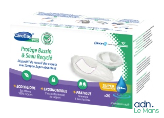 a close up of a box of disposable pads on a white background