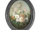 une photo d'un tableau représentant des fleurs, dans un cadre