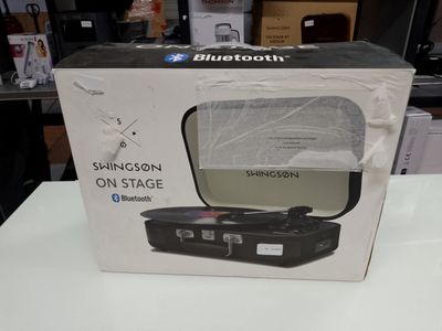 a box that has a television in it on a table