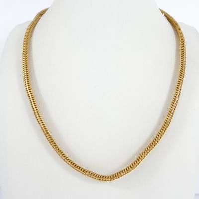 a gold chain necklace on a mannequin mannequin mannequin mannequin mannequin mannequin mannequin mannequin manne