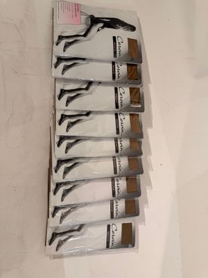 six pairs of scissors in a package on a table