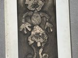 a black and white drawing of a teddy bear on a table