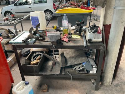 a workbench with a lot of tools on it