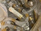 a pile of glass and brass items on a table