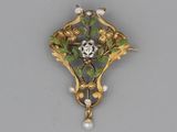 an image of a broochle with pearls and flowers on it
