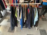 a rack of clothes that is on display in a store