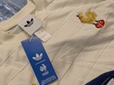 a white shirt with a blue tag on it