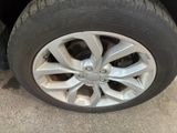 a close up of a tire on a car