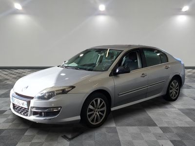 a picture of a silver car parked on a checkered floor