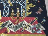 a picture of a table cloth with musical instruments on it
