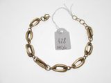 a close up of a bracelet with a price tag on it