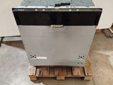 a large metal box sitting on top of a wooden pallet
