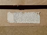 a piece of paper that has been placed on a piece of cardboard
