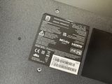 a close up of the back of a laptop with a label on it