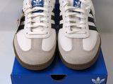 adidas superstar leather trainers in white and blue