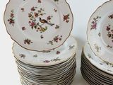 a lot of plates that are stacked on top of each other