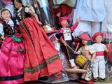 a box full of dolls that are sitting on a table