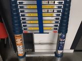 a close up of a ladder on a stand in a room