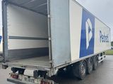 a picture of a delivery truck parked in a parking lot