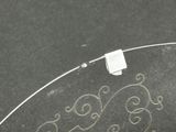 a close up of a glass plate with a design on it