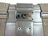 a close up of a purse with a metal buckle on it