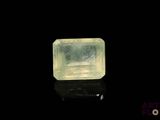an image of a yellow diamond on a black surface
