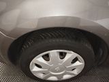 a close up of a car tire on the floor
