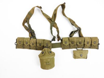 a close up of a pair of holsters on a white background