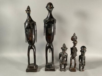 Paire de statuettes en bois noirci de Style Sénoufo.