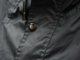 a close up of a jacket with a button on it