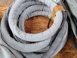 a hose that is sitting on top of a piece of plywood