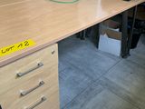 a desk that has a printer on it and a printer on it