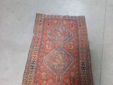rug on the floor in a room with a white floor