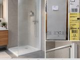 une photo d'une salle de bains avec une douche et un lavabo