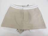 the skirt is tan and white with a white stripe on the side
